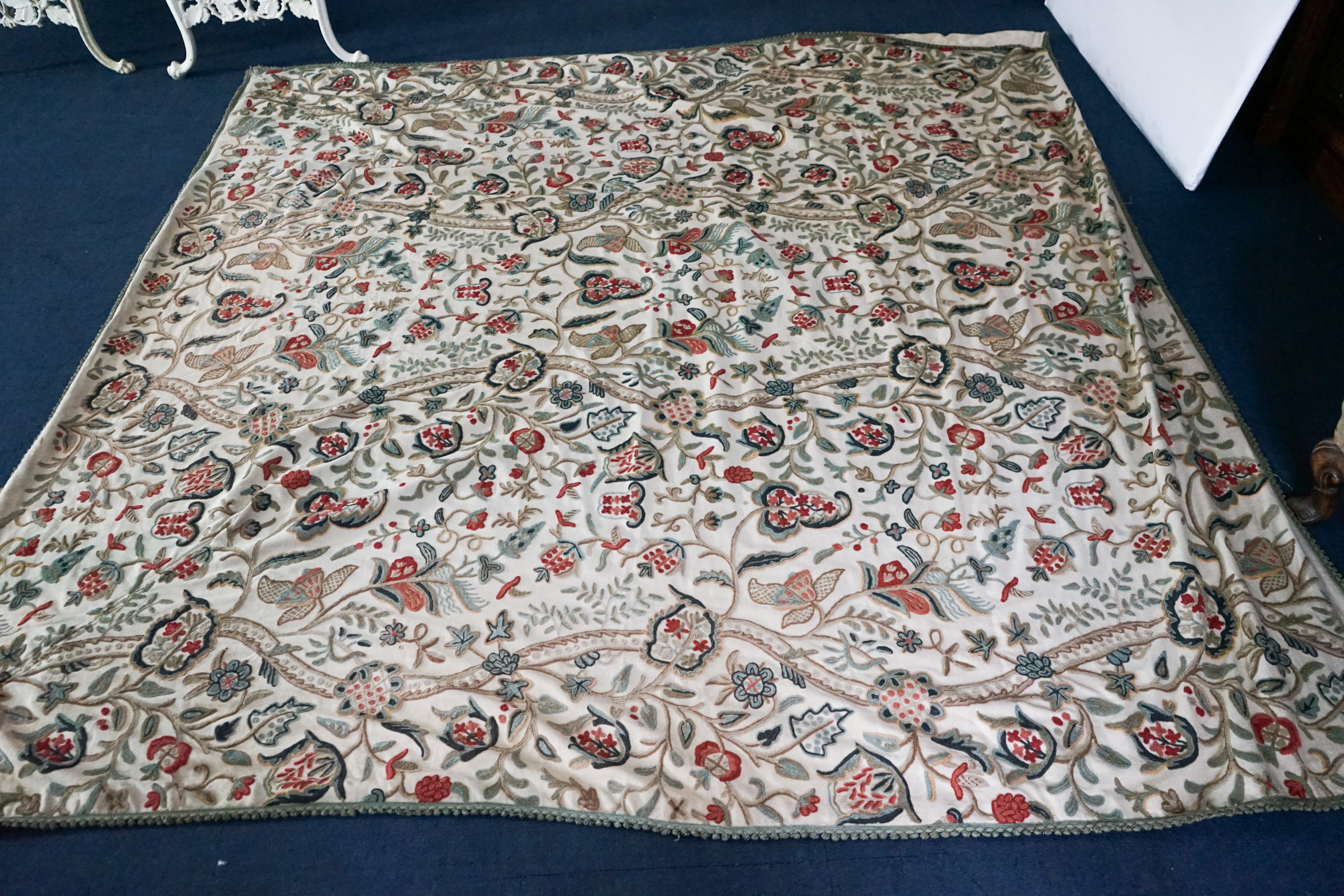 A Chelsea Textiles crewel work double bed spread, 550 x 260cm